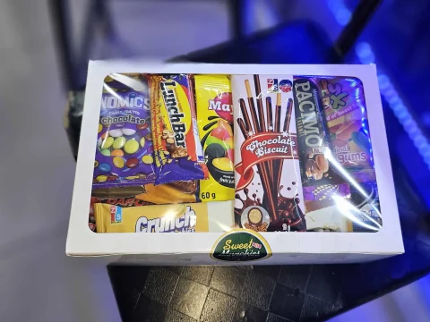 Sweet Munchies Deluxe Box packed with 10 to 12 assorted treats