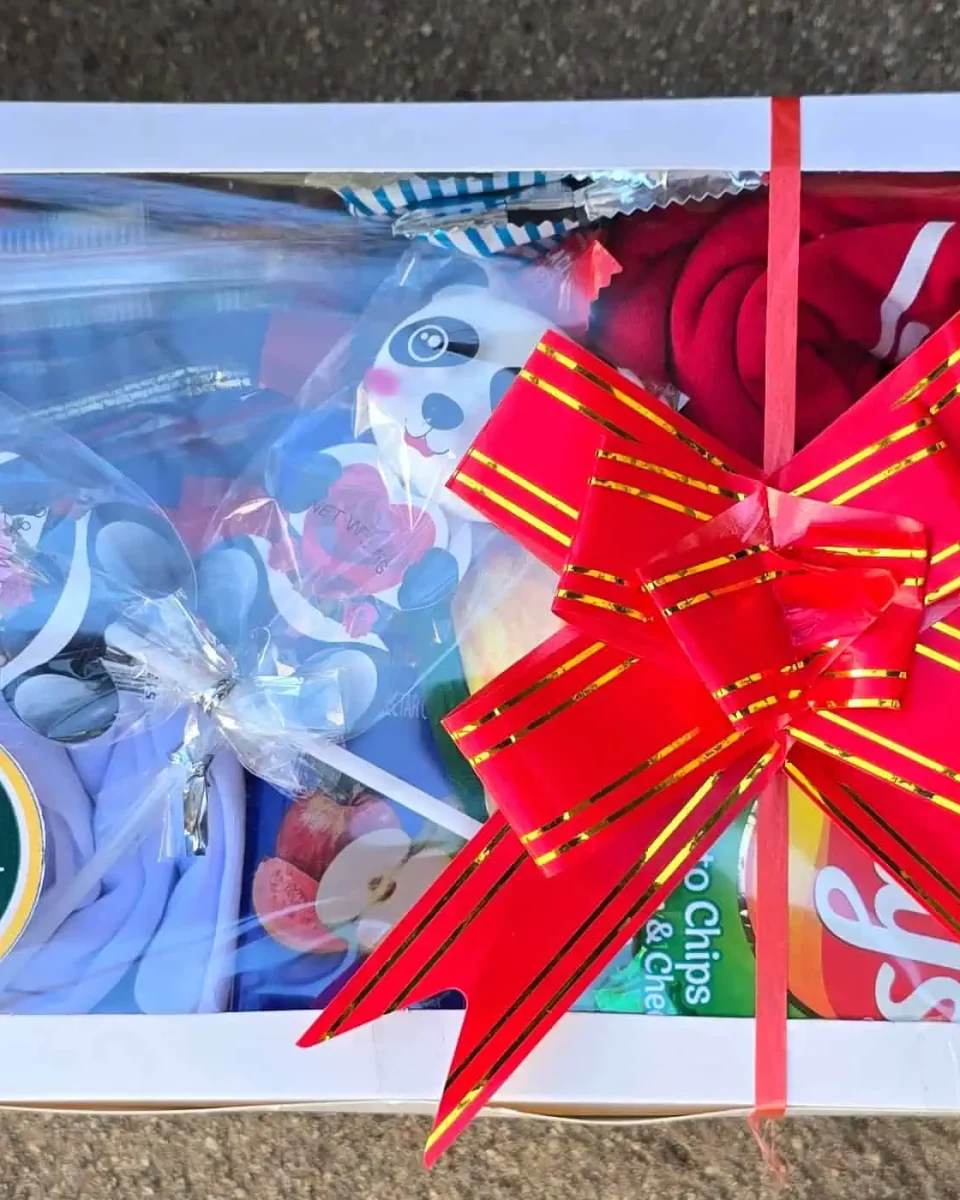 Premium Box in a white gift box finished with a satin bow
